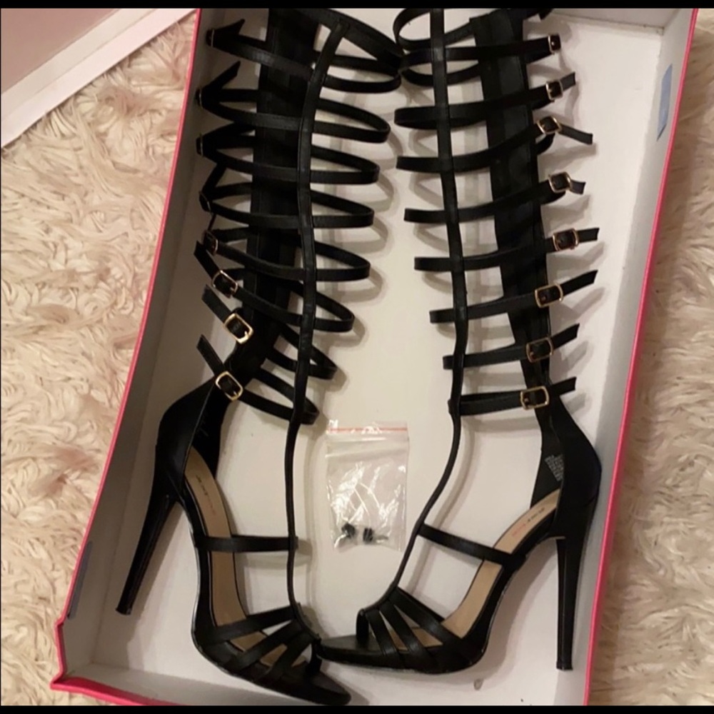 Black straps heels